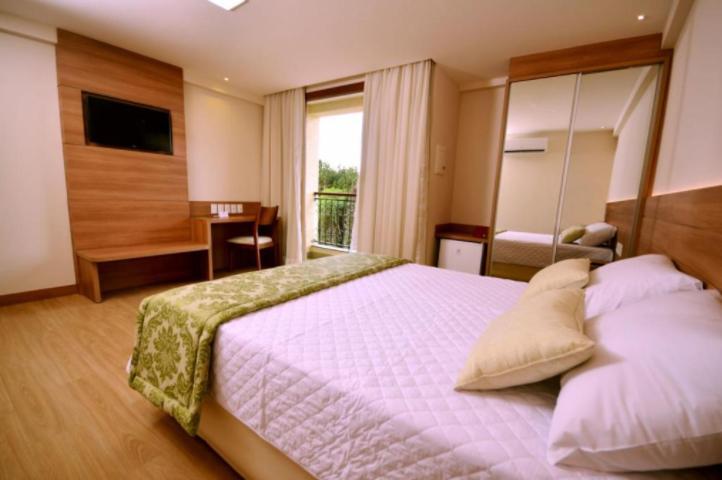 Quarto Inteiro, Condominio Vista Azul, Pedra Azul 多明戈斯马丁斯 外观 照片